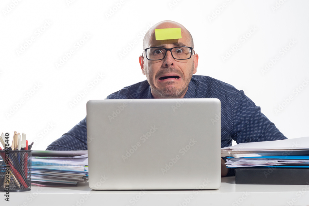 stressed man working in the office, on white background
stressed man working in the office, on white background
