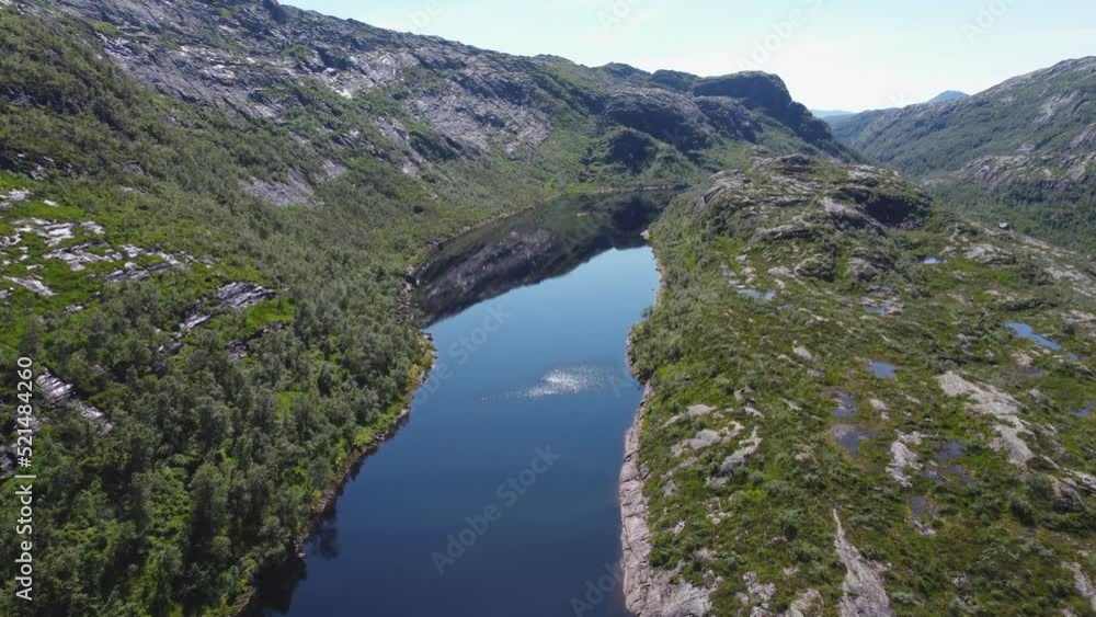 Mountains of Norway. Mountain lakes and rivers. Green trees in the mountains. Flying a drone in the mountains. Blue clear sky. Video 4k Mountains of Norway. Mountain lakes and rivers. Green trees in the mountains. Flying a drone in the mountains. Blue clear sky. Video 4k
