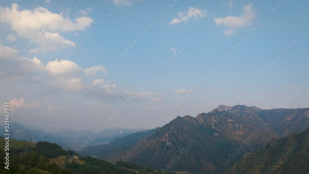 Timelapse of the Seriana valley and its mountains at evening, Orobie Alps, Bergamo, Italy Timelapse of the Seriana valley and its mountains at evening, Orobie Alps, Bergamo, Italy