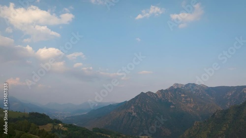 Timelapse of the Seriana valley and its mountains at evening, Orobie Alps, Bergamo, Italy photo