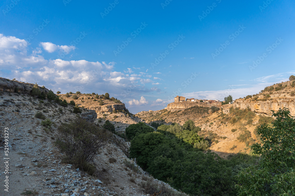 Landscape with Moscardón village in the upper part of the hill, in the province of Teruel, Aragón (Spain)