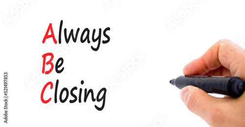 ABC always be closing symbol. Concept words ABC always be closing on a beautiful white background. Businessman hand. Business and ABC always be closing concept. Copy space.