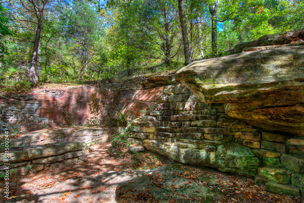 Fototapeta premium Old stone work on a forest hillside