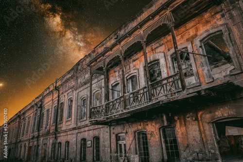 Exterior of an old building under the Milky way in Gyumri, Armenia photo