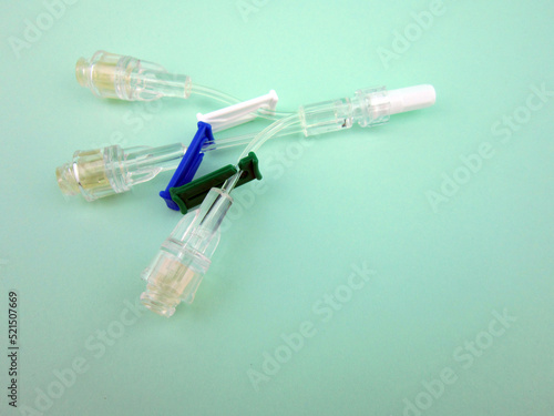 multiway vein valve on green background photo