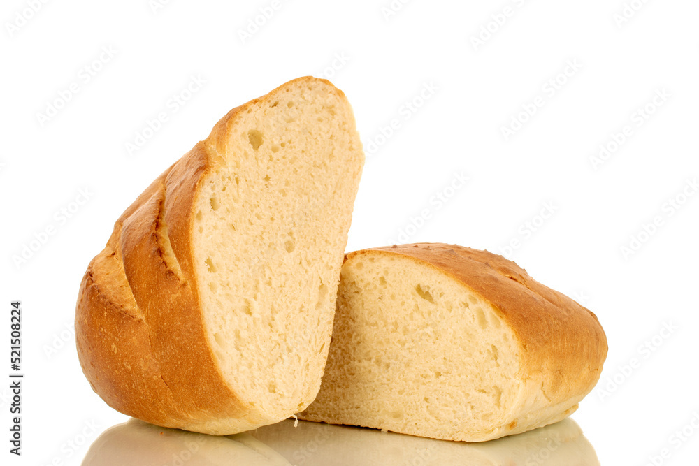 Two halves of a fragrant fresh long loaf, close-up, isolated on a white background.