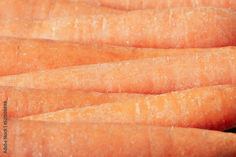 Image of raw carrots lined up, background Image of raw carrots lined up, background