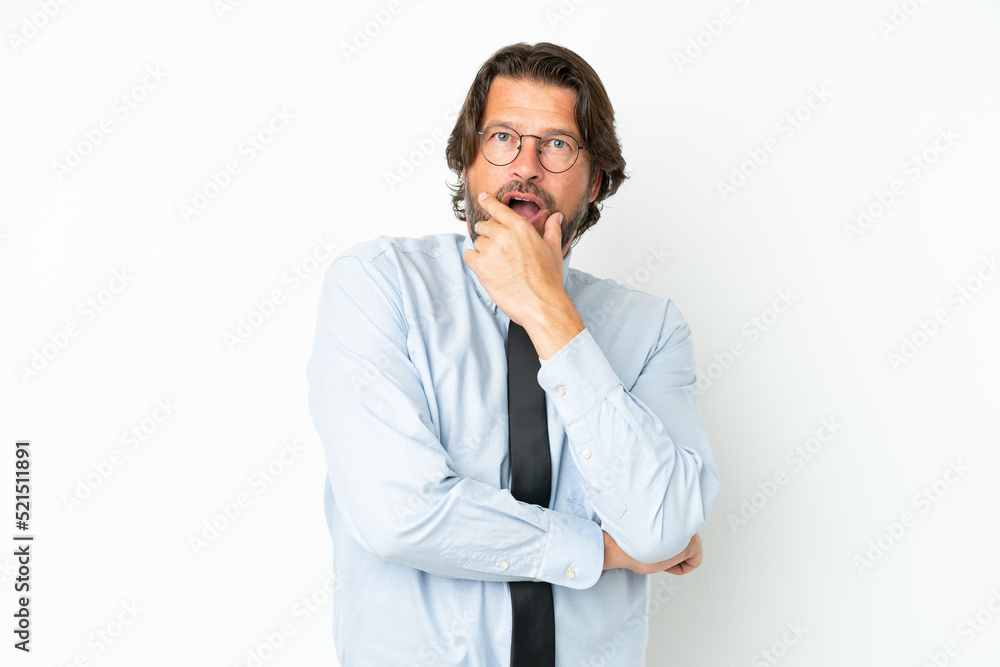 Senior dutch business man isolated on white background surprised and shocked while looking right Senior dutch business man isolated on white background surprised and shocked while looking right
