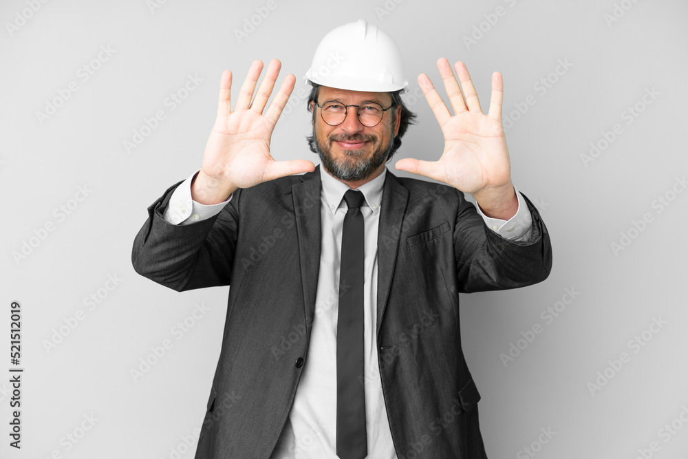 Young architect man with helmet over isolated background counting ten with fingers Young architect man with helmet over isolated background counting ten with fingers