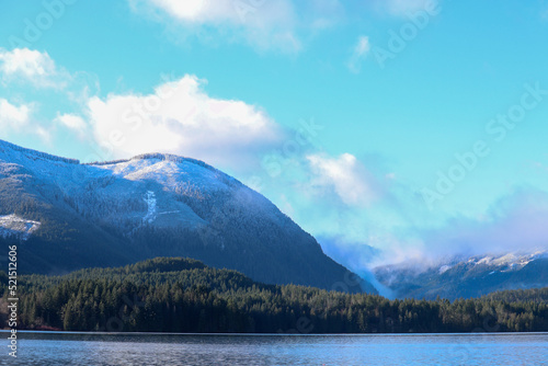 Snowy Hilltop Across the Lake