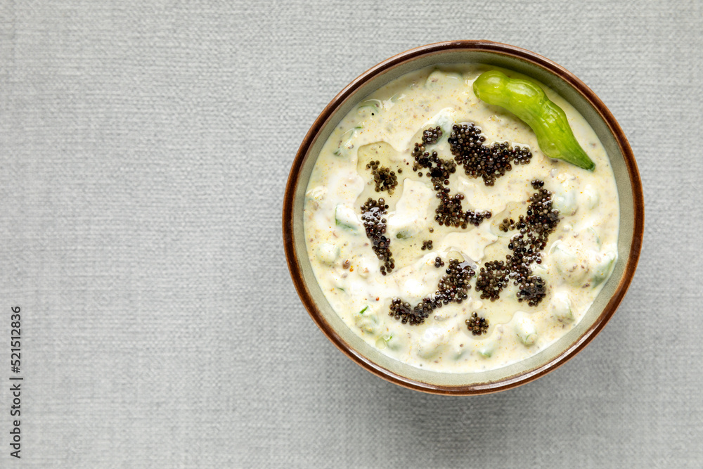 Mogri Raita tempered with black mustard seeds. Mogri Raita tempered with black mustard seeds.
