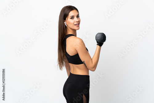 Young sport woman isolated on white background making weightlifting