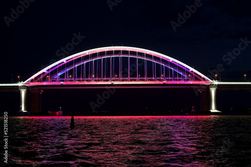 Fototapeta Naklejka Na Ścianę i Meble -  Seascape with a view of the illumination of the Crimean Bridge