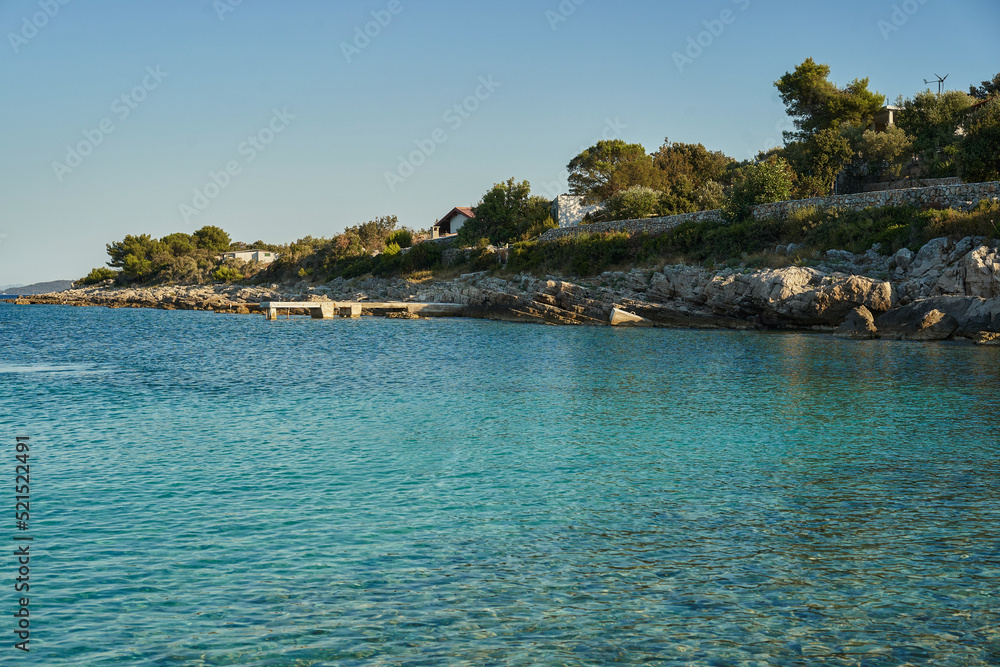 Coast of the Croatian sea with deep blue water.