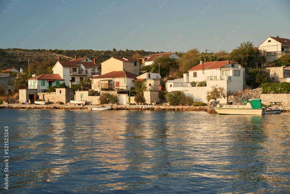 European Croatian village on the island. Houses are close to the water