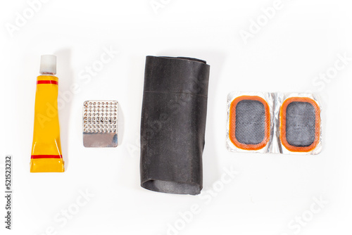 bicycle tire repair kit isolated on white background photo
