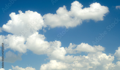 White clouds and blue sky on a sunny summer day