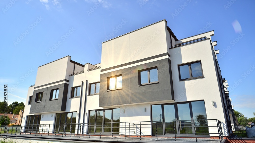 Obraz premium Terraced family home in newly developed housing estate. The real estate market in the suburbs.