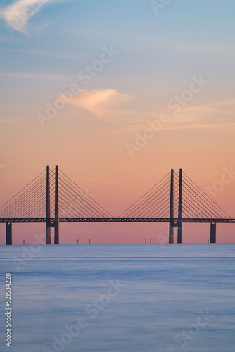 The Oresund Bridge is a combined motorway and railway bridge between Sweden and Denmark (Malmo and Copenhagen). Long exposure. Selective focus. © PhotosbyPatrick