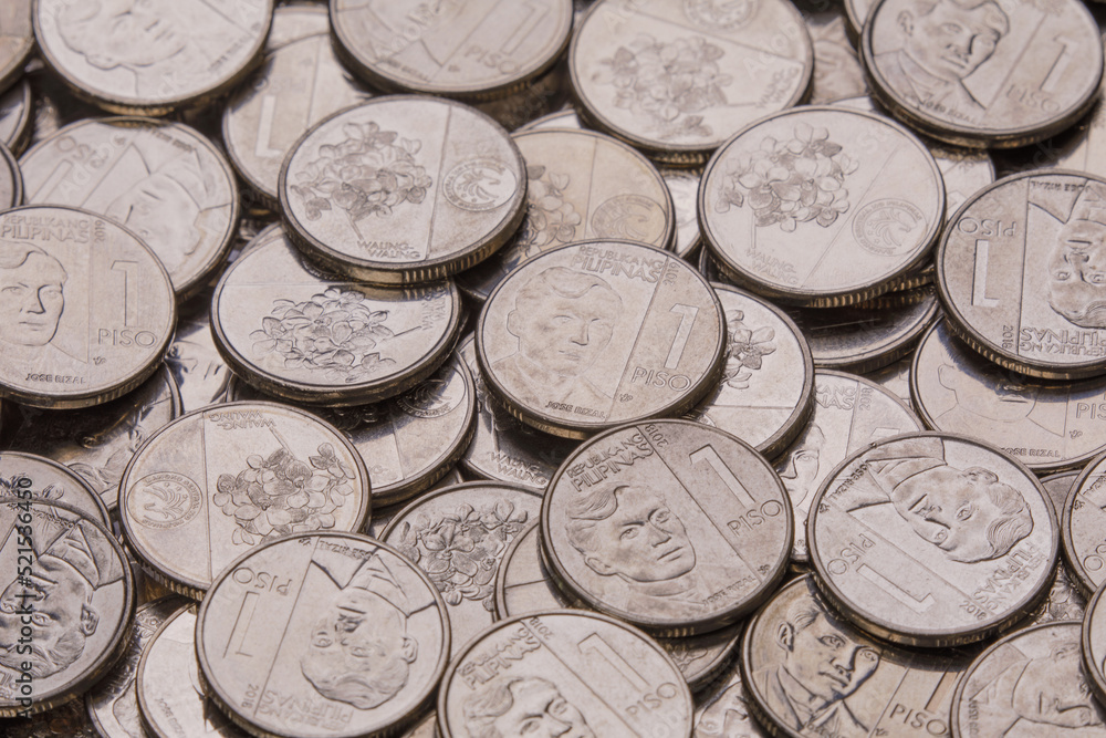 Close up of new One Piso Philippine coins Close up of new One Piso Philippine coins