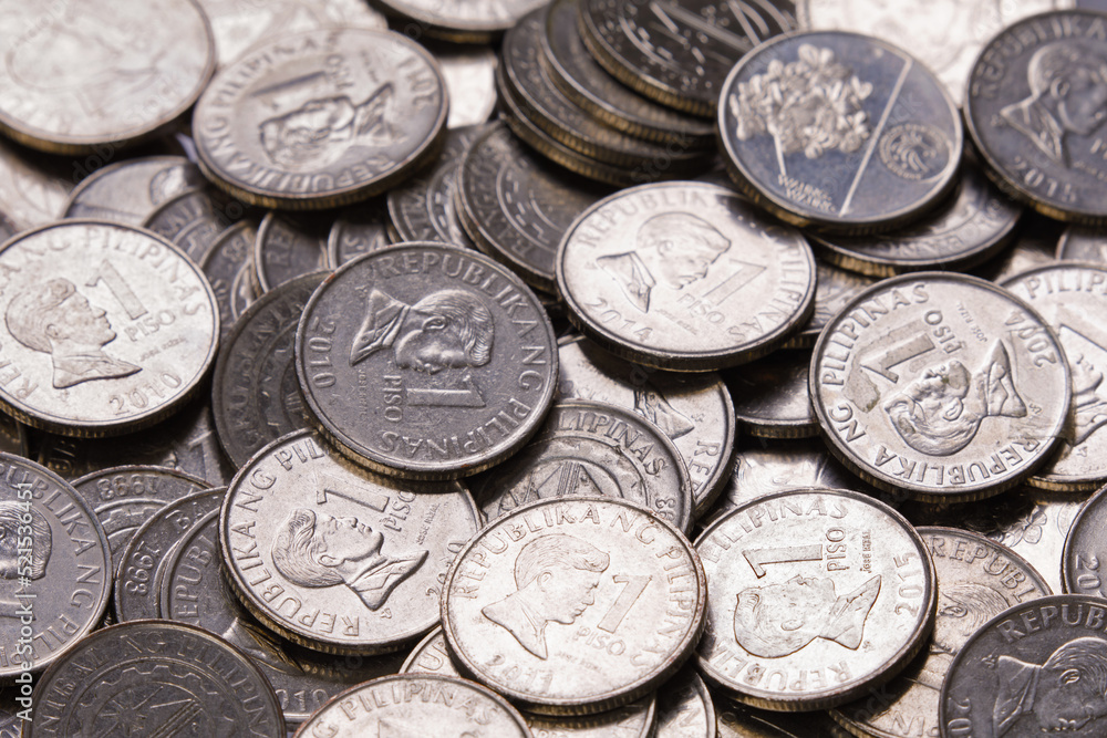 Close up of old One Piso Philippine coins Close up of old One Piso Philippine coins