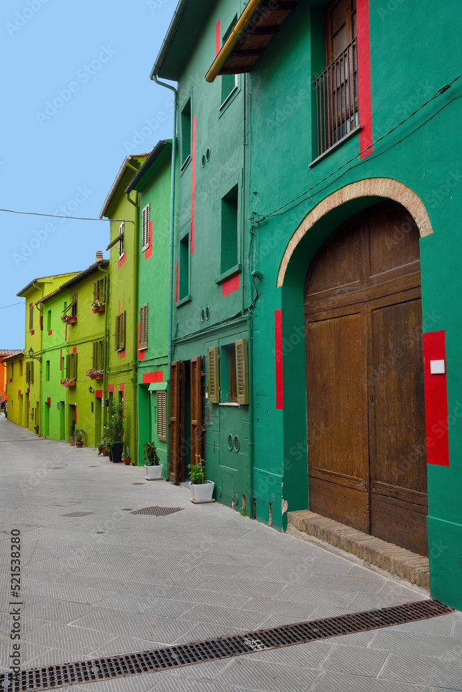 Fototapeta premium the village with the colorful houses Ghizzano tuscany Italy