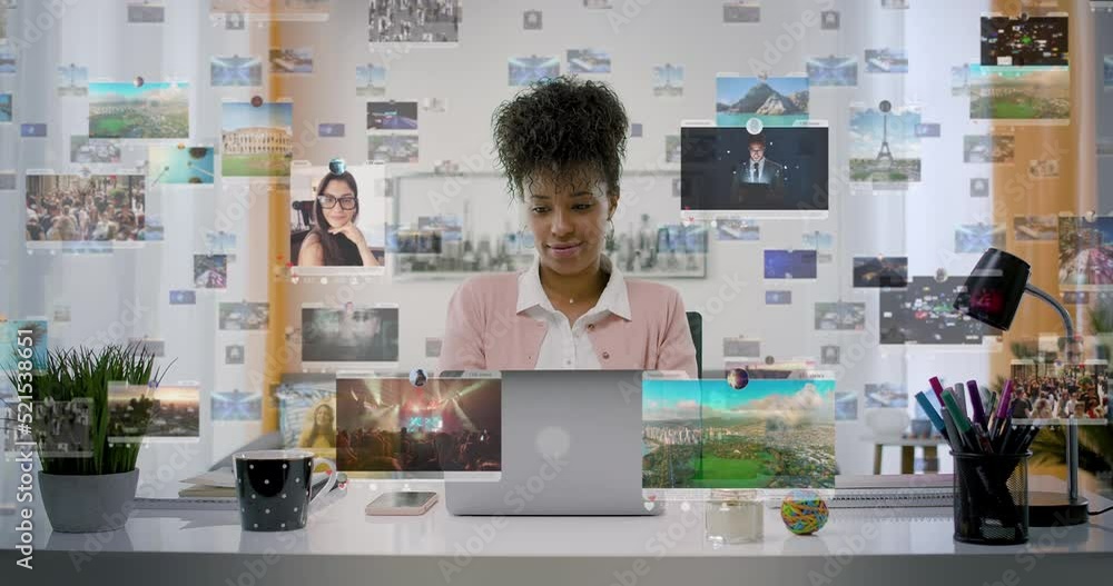 Young Pretty Business Woman Working on Laptop Computer At Home Office. Holographic Social Media Interface Animations Appearing. Social Network. Likes, Comments, Followers.