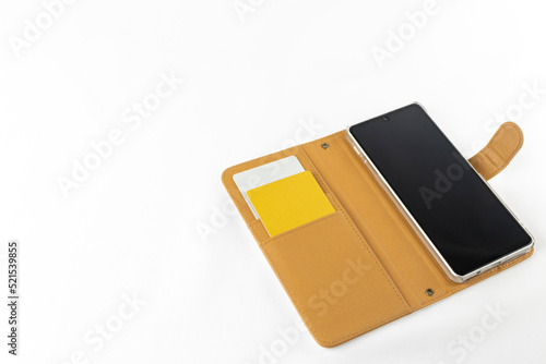 Obraz na płótnie スマートフォンケースに入ったクレジットカード w salonie