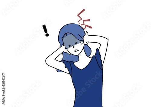急な頭痛に悩まされる女性