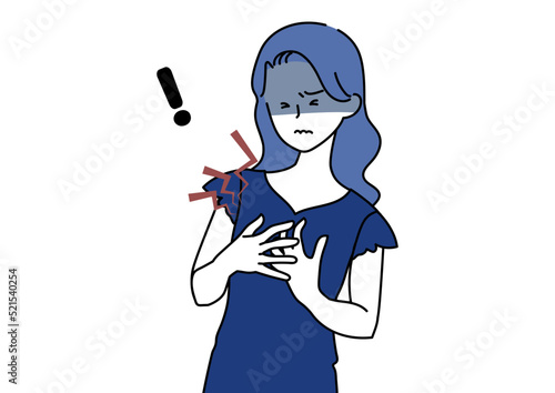 急な胸の痛みに悩まされる女性