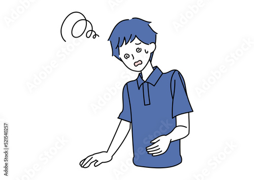 めまいに襲われる男性