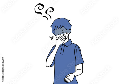 吐き気に襲われる男性