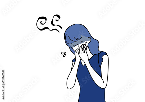 吐き気に襲われる女性