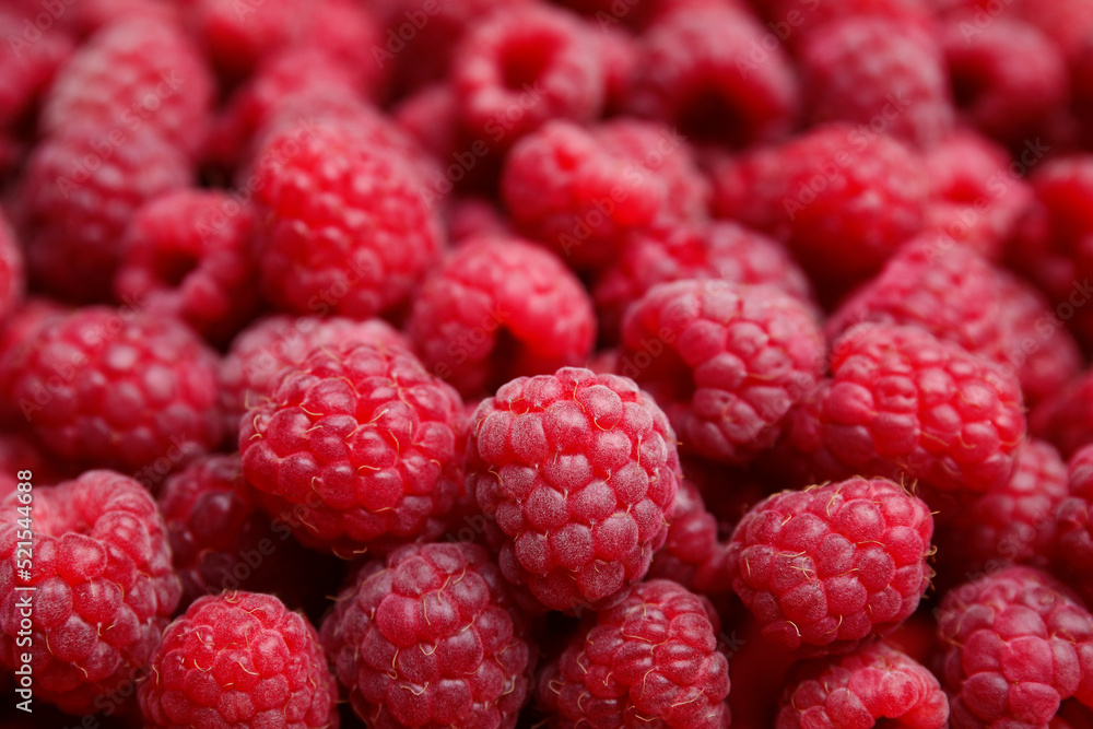 Many fresh ripe raspberries as background, closeup Many fresh ripe raspberries as background, closeup