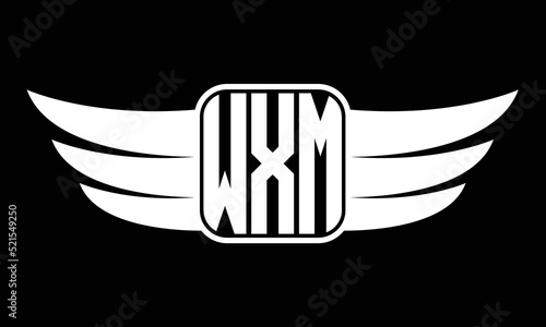 WXM three-letter Wing logo design. flying Vector template photo