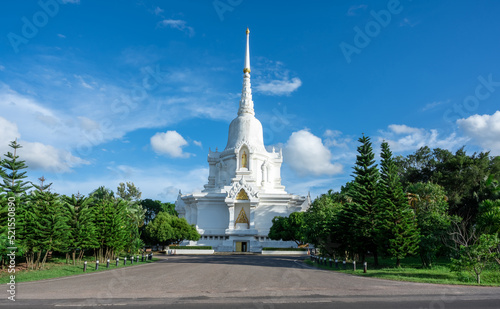 White pagodas with blue sky background. Thailand Temple.
