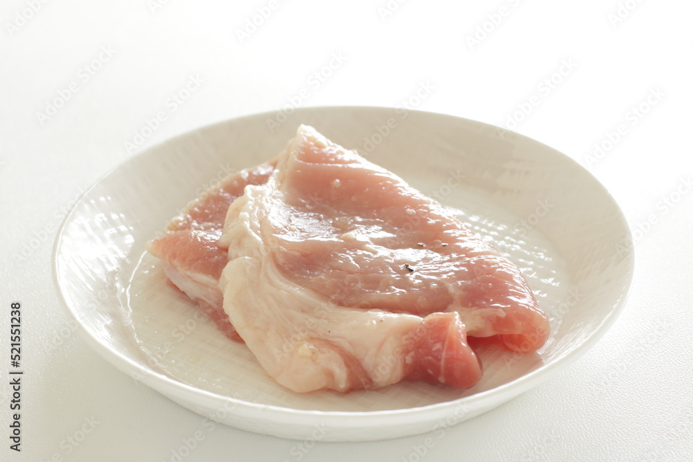 Prepared seasoning pepper and salt on sliced pork Prepared seasoning pepper and salt on sliced pork