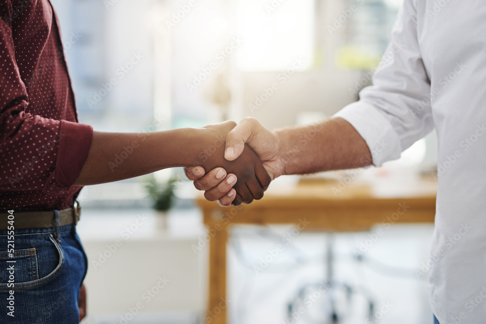 Handshake, agreement and meeting of business people in the office after a good deal. Closeup of diverse corporate employees greeting at the workplace in unity, support and trust Handshake, agreement and meeting of business people in the office after a good deal. Closeup of diverse corporate employees greeting at the workplace in unity, support and trust