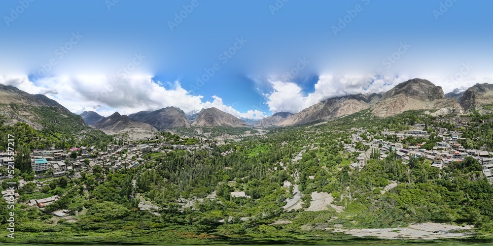 An aerial 360-degree panorama of Hunza Valley, its surrounding mountains, and Nagar District during the summer season. 