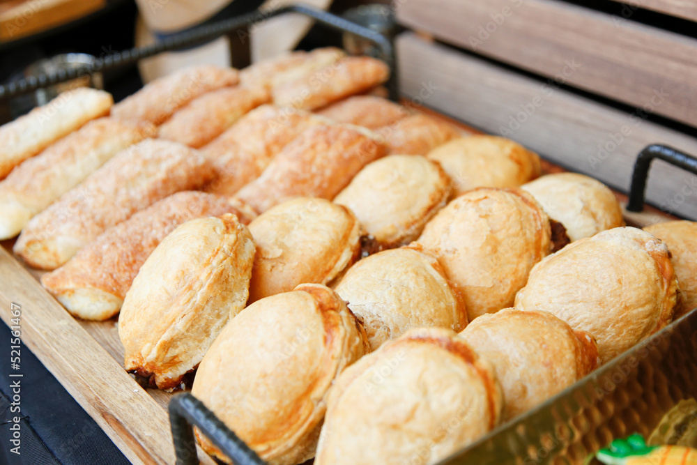 A view of a tray full of Cuban pastries, seen at a catered event.