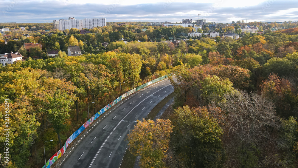 Top view of the road through the forest park in the city of Kharkov