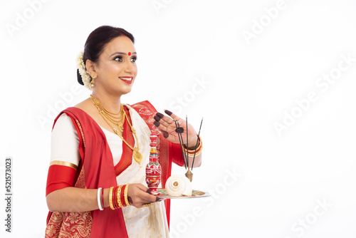 Bengali woman with puja thali.