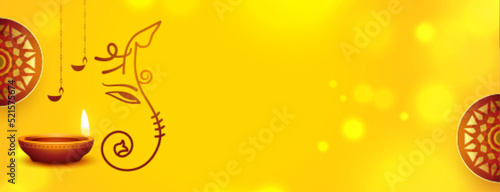 hindu traditional ganesh chaturthi festival yellow banner with diya
