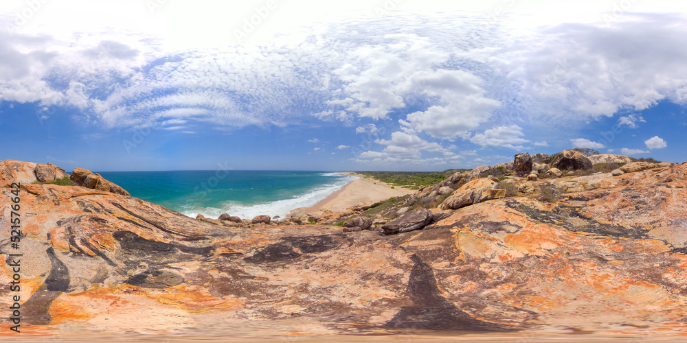 View from the cliff to a beautiful tropical beach and ocean. Elephant Rock, Arugam Bay, Sri Lanka. 360 panorama.