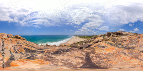 View from the cliff to a beautiful tropical beach and ocean. Elephant Rock, Arugam Bay, Sri Lanka. 360 panorama.