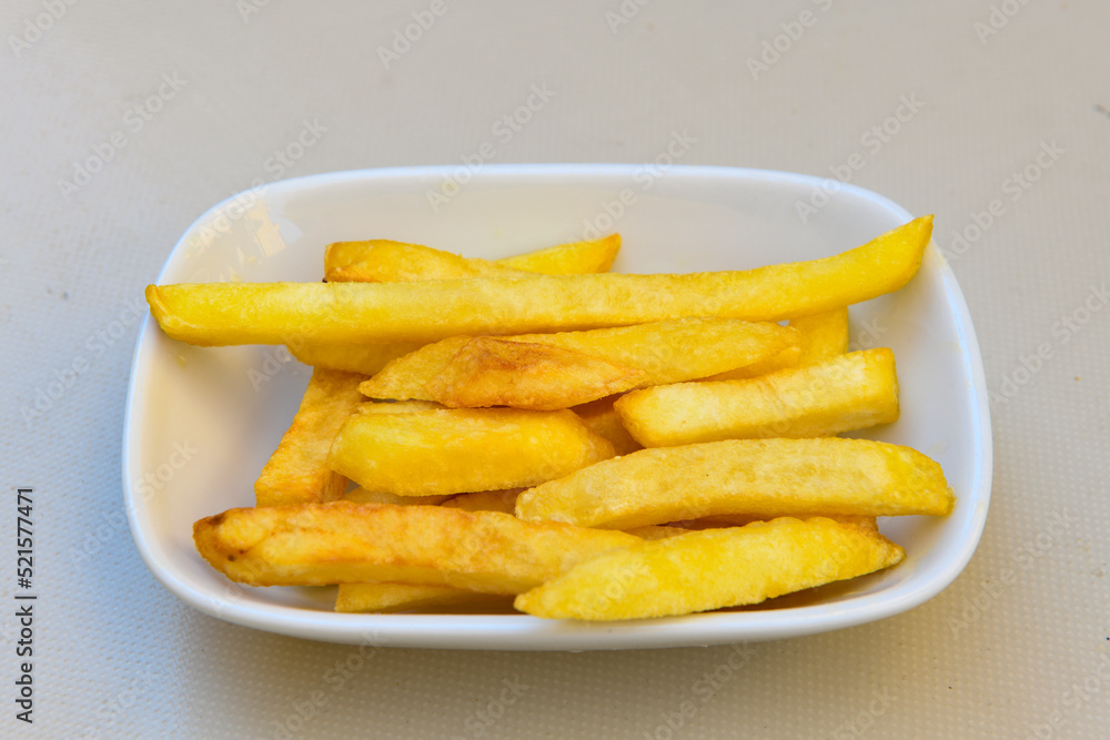 French fries Snack food crispy potato . Fast food or snacks concept. Patates cips. French fries Snack food crispy potato . Fast food or snacks concept. Patates cips.