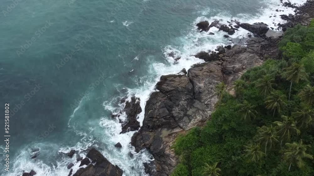 Ocean landscape, top shot of the waves crashing against the rocky coast. Ocean landscape, top shot of the waves crashing against the rocky coast.