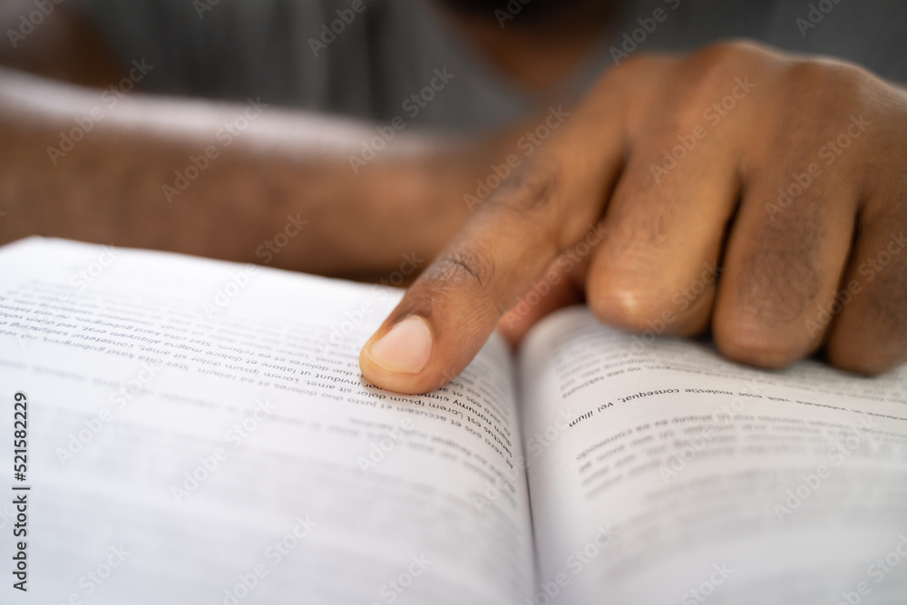 Naklejka premium American African Prayer Man Studying Bible Book