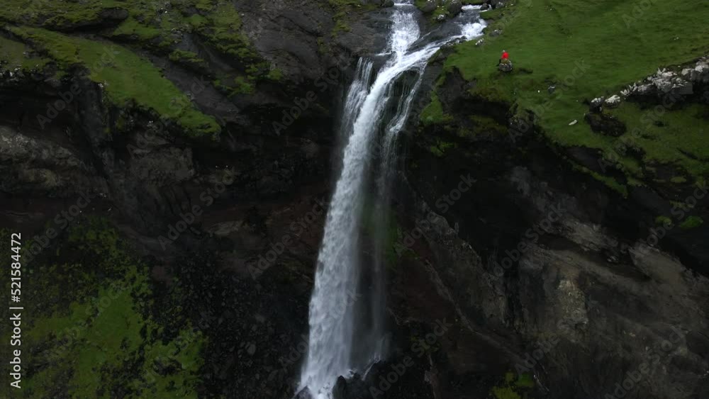 Skardsafossur Waterfall on Vagar in the Faroe Islands by Drone Skardsafossur Waterfall on Vagar in the Faroe Islands by Drone