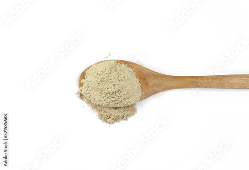 Ashwagandha pile in a wooden spoon isolated on white. Ashwagandha powder isolated on white 